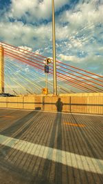 Bridge against sky in city