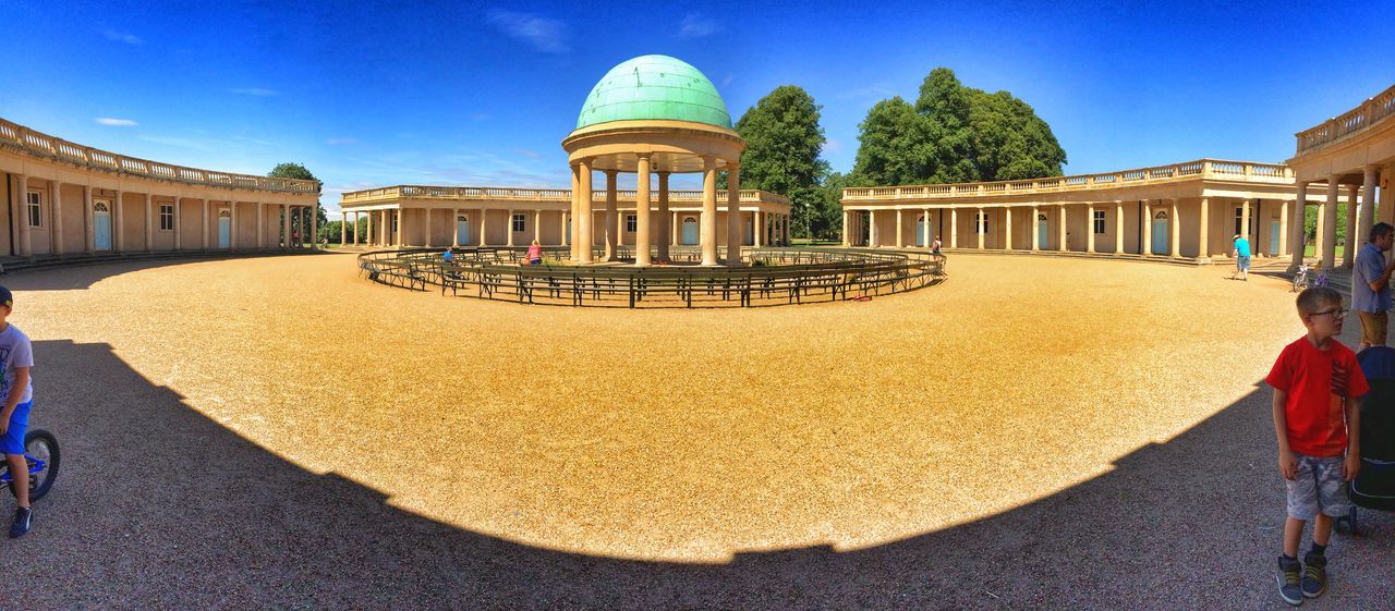 architecture, building exterior, built structure, blue, incidental people, sunlight, person, city, large group of people, men, travel destinations, lifestyles, tourism, travel, leisure activity, tourist, shadow, famous place, day