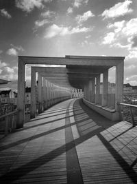 Pier over sea against sky