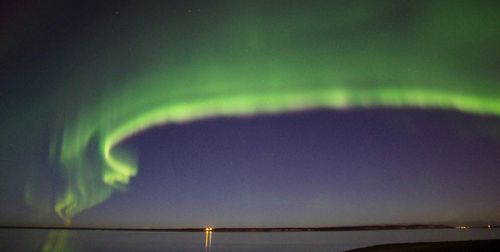 Scenic view of sea against sky at night