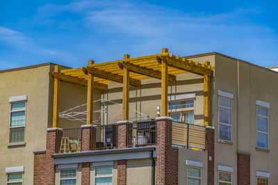 Low angle view of building against blue sky