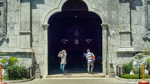 People standing outside building