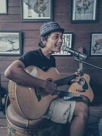 Young man playing guitar