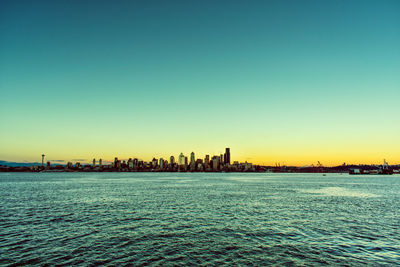 Scenic view of sea against clear blue sky