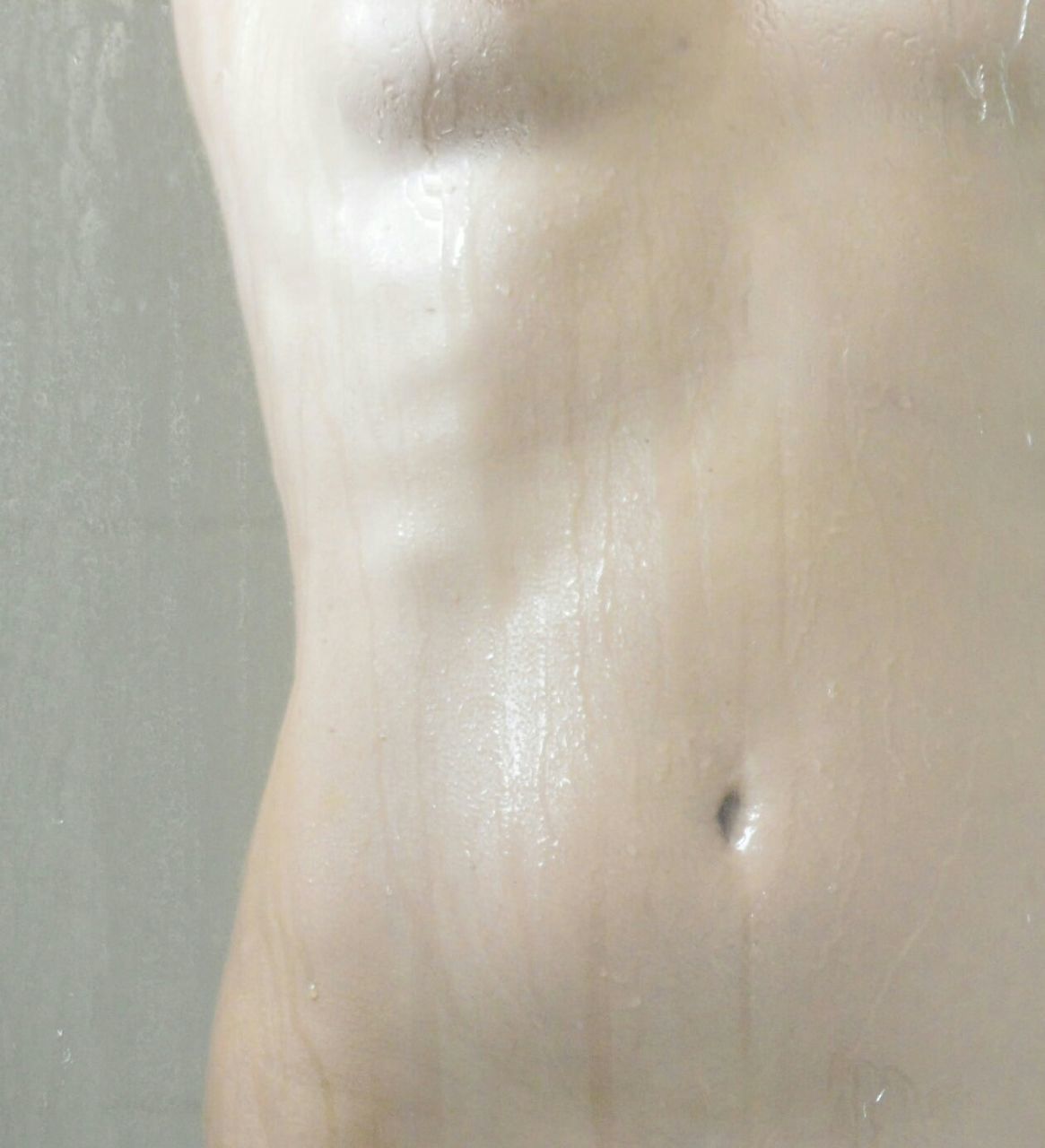 indoors, close-up, water, lifestyles, wet, transparent, sensuality, person, glass - material, drop, reflection, human skin, young adult, leisure activity, part of, wall - building feature, shirtless