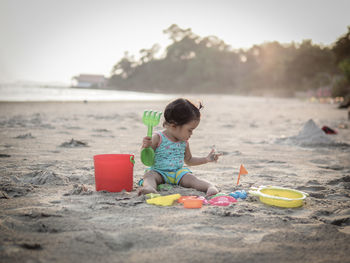 Girl playing on beach