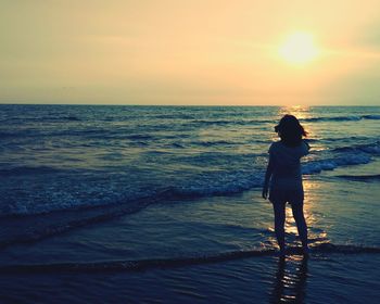 Scenic view of sea at sunset