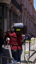 Back of the worker on the street