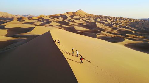 Scenic view of desert against clear sky