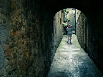 People walking in tunnel
