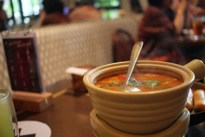 Close-up of tom yam soup in bowl on table