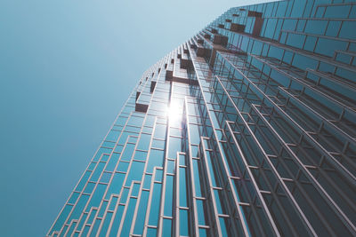 Low angle view of modern building against clear sky