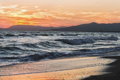 Scenic view of sea against sky during sunset