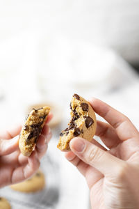 Close-up of hand holding ice cream