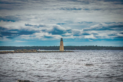 View of sea against sky in city