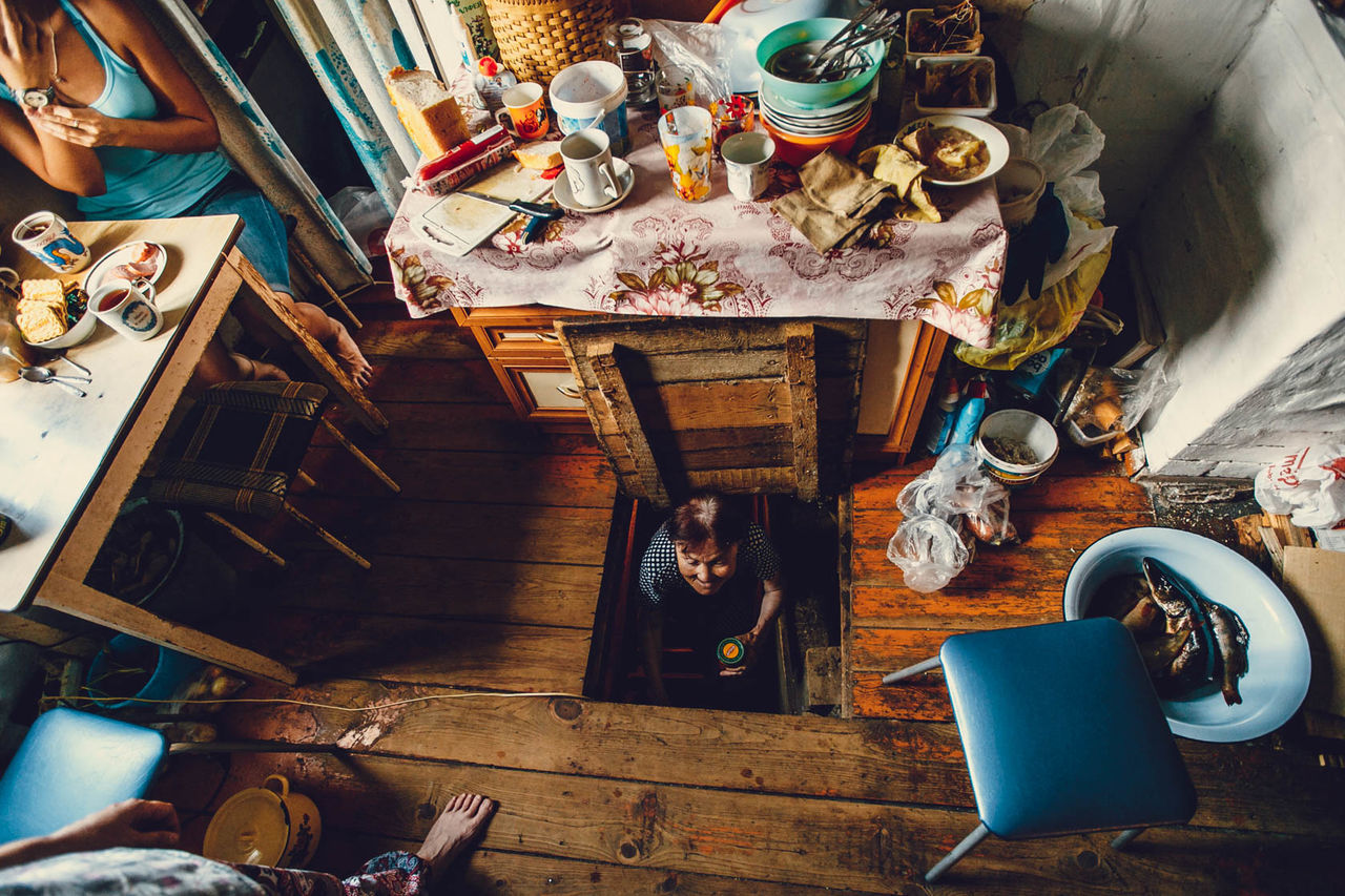 indoors, high angle view, messy, table, workshop, working, day, art studio, no people