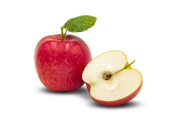 Close-up of apple against white background