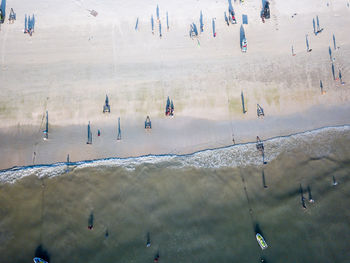 High angle view of people on snow covered land