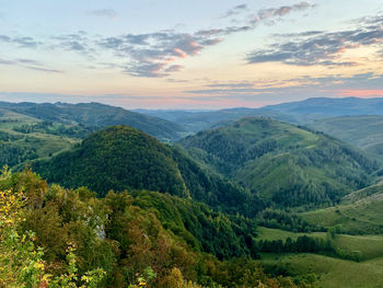 Scenic view of landscape against sky during sunset