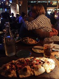 Man preparing food on table