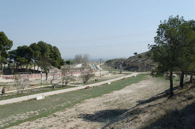 Scenic view of trees against clear sky