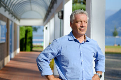 Portrait of man standing outdoors