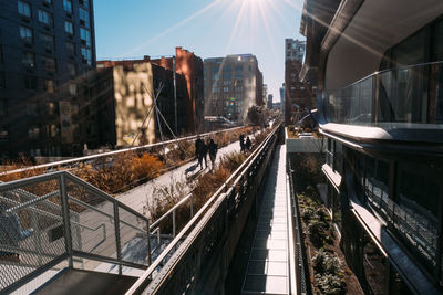 Panoramic view of railroad tracks amidst buildings in city