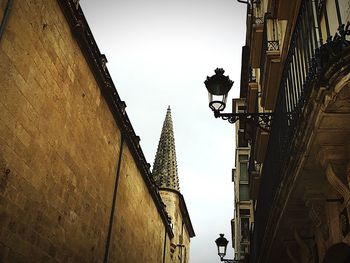 Low angle view of bell tower against clear sky