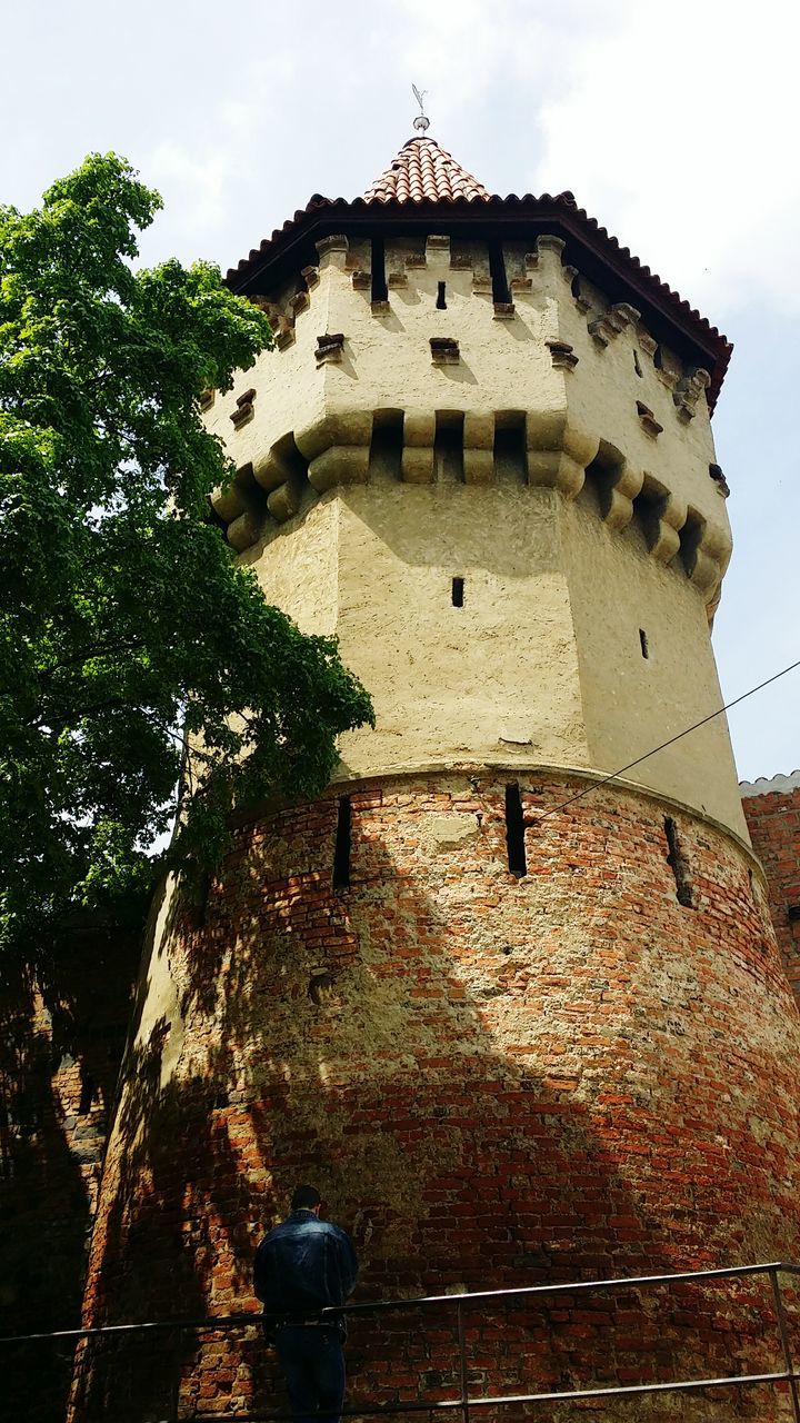 architecture, built structure, building exterior, low angle view, history, sky, old, ancient, the past, tower, old ruin, castle, famous place, travel destinations, stone wall, place of worship, tree, religion, ancient civilization, day