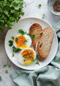 Delicious gourmet breakfast. rye bread with boiled egg