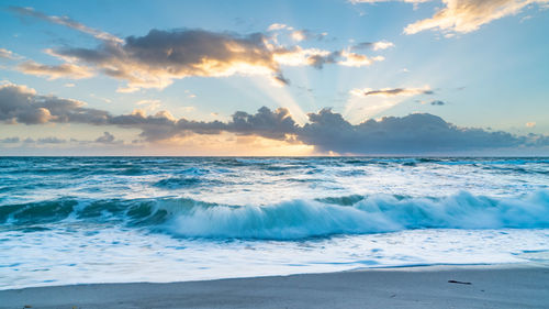 Scenic view of sea against sky during sunset
