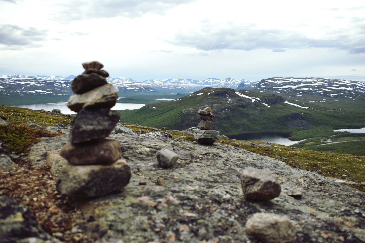 mountain, sky, cloud - sky, nature, scenics, tranquil scene, tranquility, beauty in nature, day, no people, rock - object, outdoors, landscape, mountain range, water