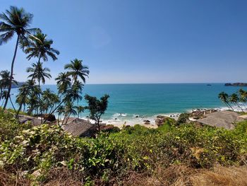 Scenic view of sea against clear blue sky