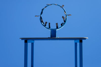 Low angle view of basketball hoop against sky