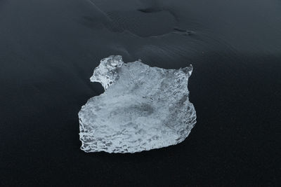 Close-up of ice over sea