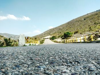 Surface level of road against sky