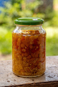 Close-up of food in jar on table