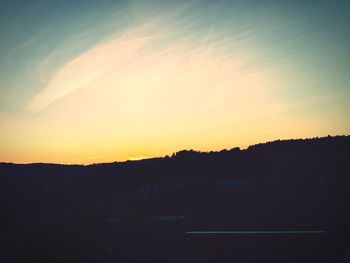 Scenic view of landscape at sunset