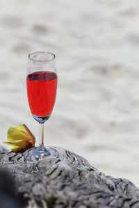 Close-up of red wine glass