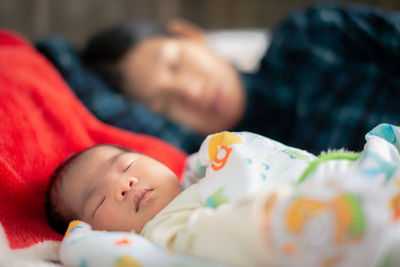 Cute baby sleeping on bed