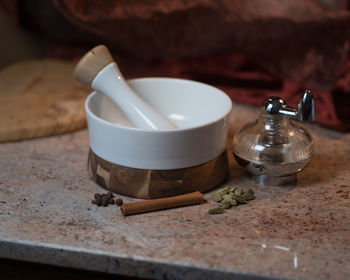 Close-up of tea cup on table