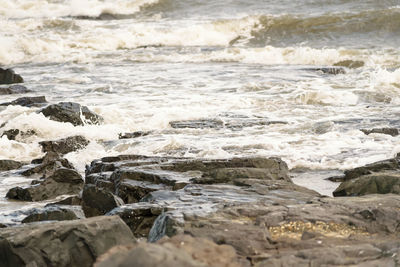 Close-up of rocks in sea