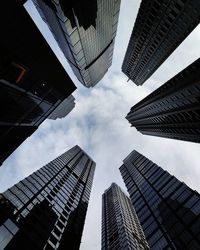 Low angle view of modern buildings against sky