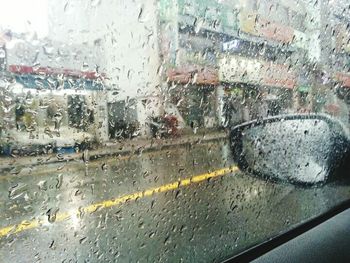 Wet glass window in rainy season