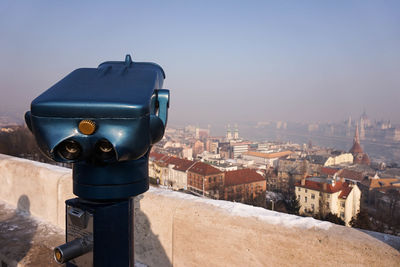 Close-up of cityscape against clear sky