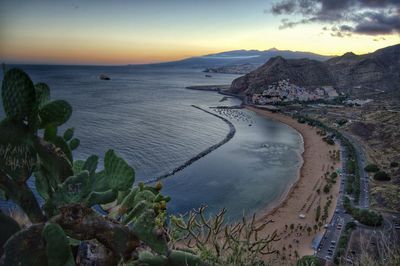 Scenic view of sea at sunset