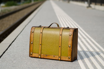 Suitcase on railroad station platform
