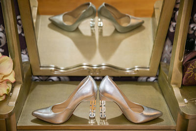Low section of woman in high heels