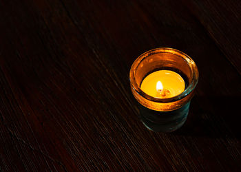 High angle view of illuminated lamp on table