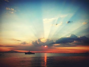 Scenic view of sea at sunset